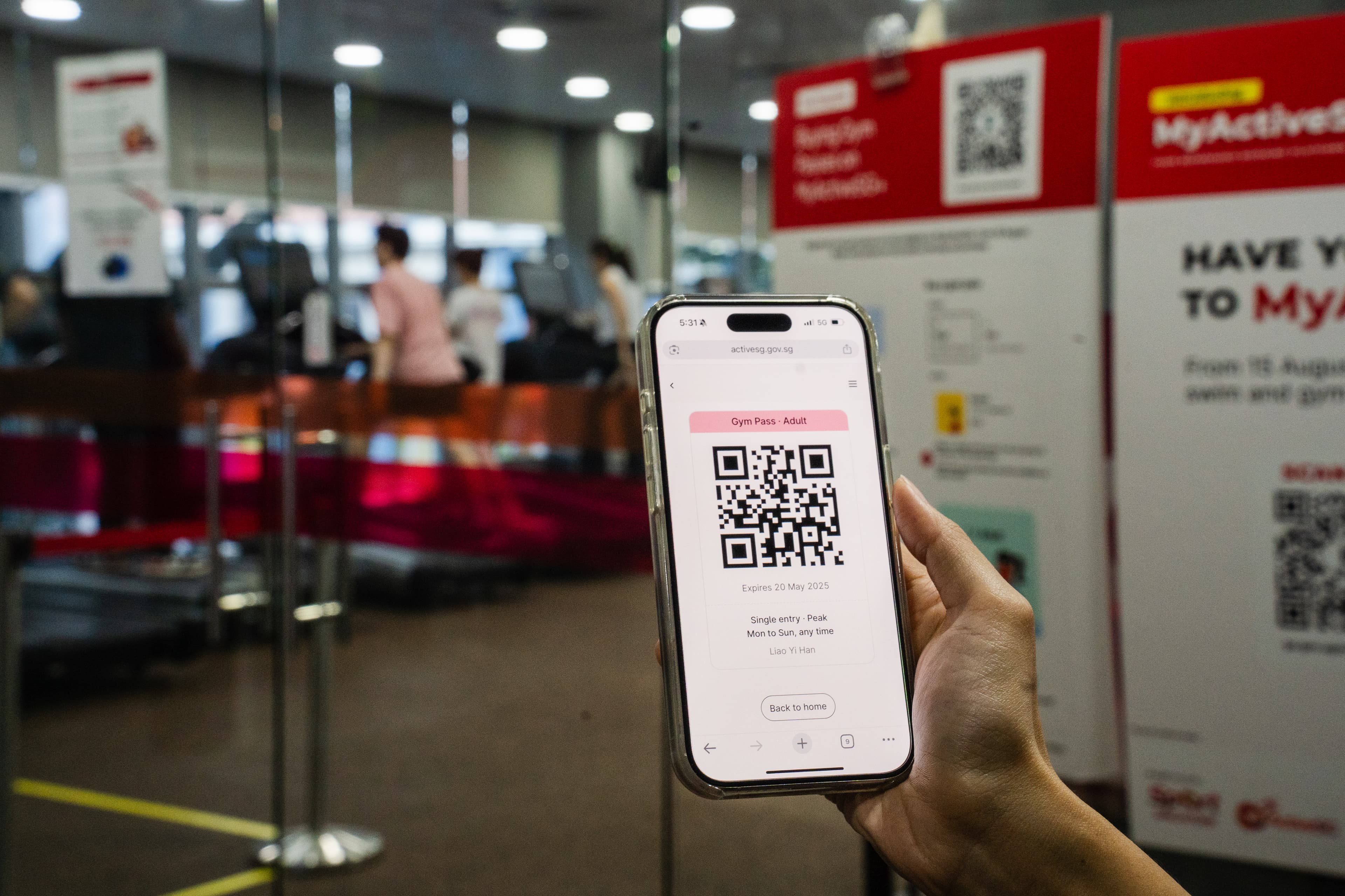 Person using ActiveSG app